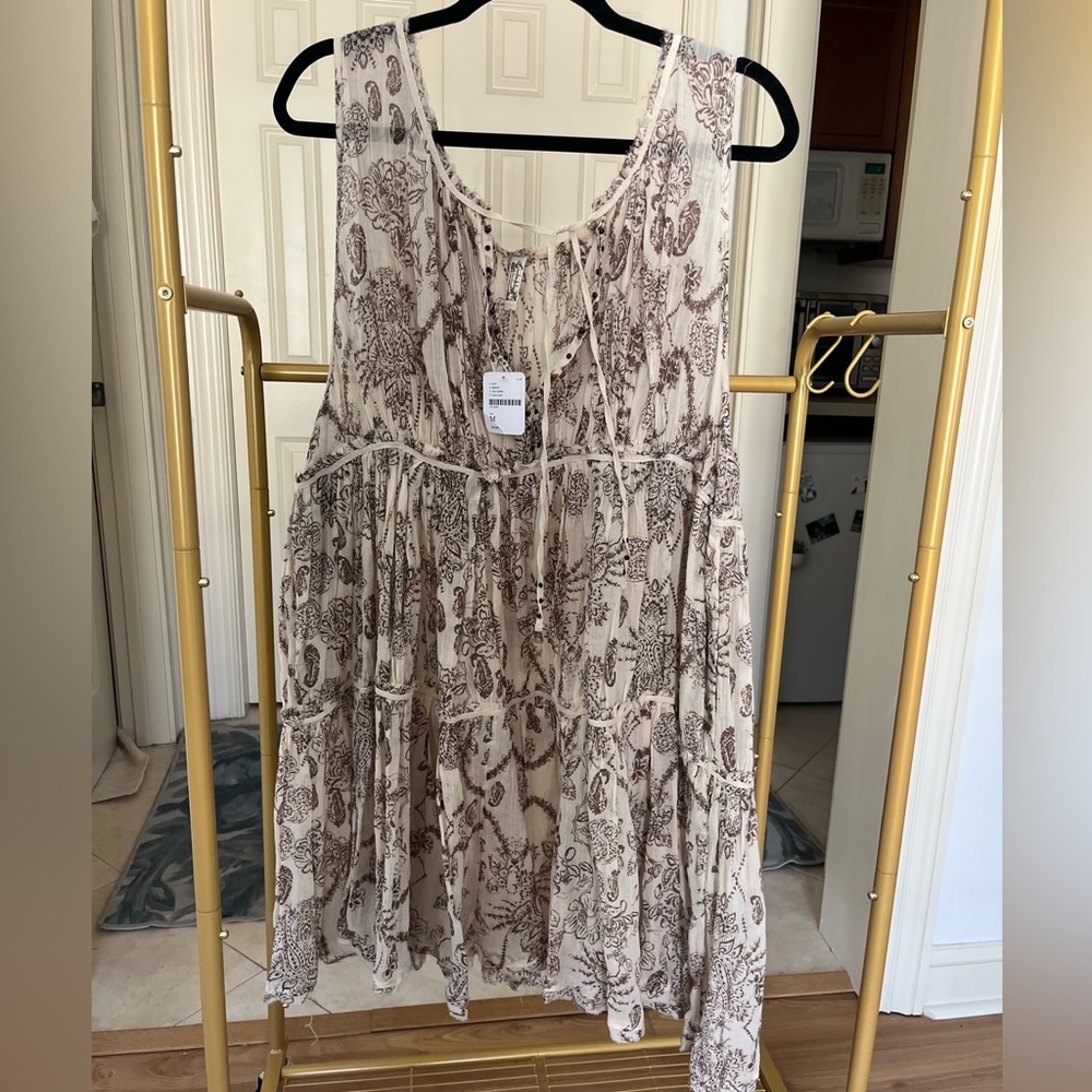 NWT- Free People light weight dress. V-neck with small rivet detailing